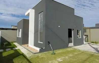 Imagem: A casa possui 3 Dormitórios, 2 Banheiros, 3 Vagas na garagem