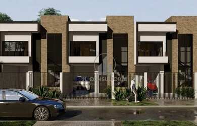 Imagem: A casa possui 3 Dormitórios, 2 Banheiros, 2 Vagas na garagem