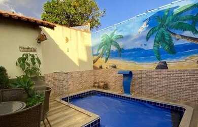 Imagem: A casa possui 2 Dormitórios, 3 Banheiros, 1 Vaga na garagem