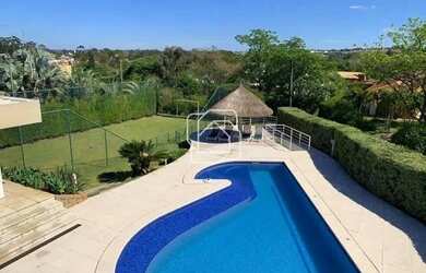 Imagem: A casa em condomínio possui 4 Dormitórios, 5 Banheiros, 3