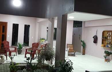 Imagem: A casa possui 3 Dormitórios, 3 Banheiros, 2 Vagas na garagem