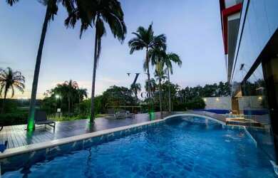 Imagem: A casa possui 5 Dormitórios, 5 Banheiros, 5 Vagas na garagem