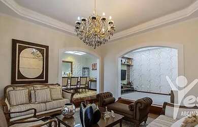 Imagem: A casa possui 4 Dormitórios, 5 Banheiros, 5 Vagas na garagem