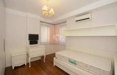 Imagem 8: Apartamento semimobiliado com vista para o mar, 4 dormitórios, sendo 2 suítes, 2 vagas