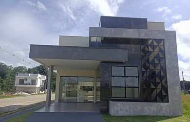 Imagem: A casa em condomínio possui 3 Dormitórios, 4 Banheiros, 1