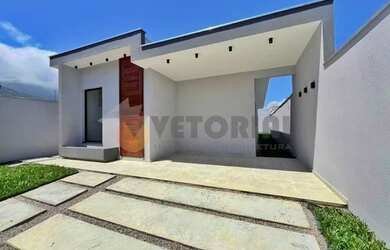 Imagem: A casa possui 3 Dormitórios, 2 Banheiros, 3 Vagas na garagem