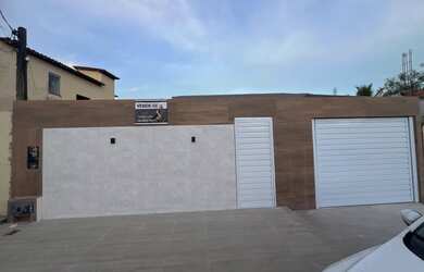 Imagem: A casa possui 3 Dormitórios, 3 Banheiros, 2 Vagas na garagem