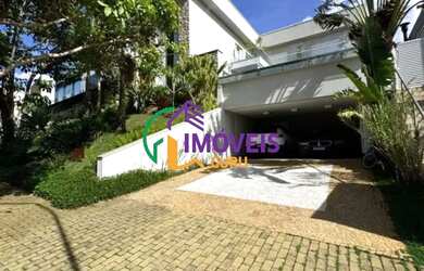 Imagem: A casa em condomínio possui 5 Dormitórios, 5 Banheiros, 4