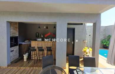 Imagem: A casa possui 3 Dormitórios, 3 Banheiros, 4 Vagas na garagem