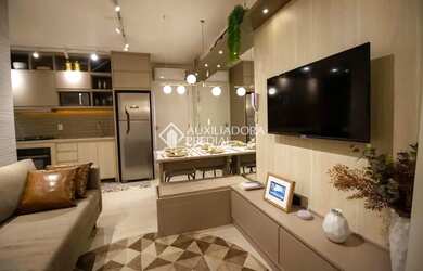 Imagem: O apartamento possui 2 Dormitórios, 1 Banheiro, 1 Vaga na garagem