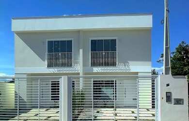 Imagem: A casa possui 3 Dormitórios, 3 Banheiros, 2 Vagas na garagem