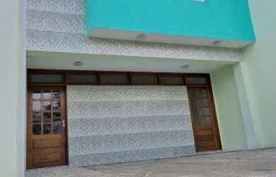 Imagem: A casa possui 3 Dormitórios, 3 Banheiros, 2 Vagas na garagem