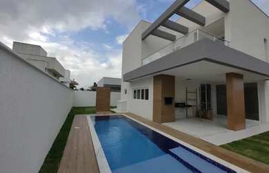 Imagem: A casa em condomínio possui 5 Dormitórios, 5 Banheiros, 2