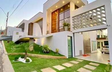 Imagem: A casa em condomínio possui 4 Dormitórios, 5 Banheiros, 410m²