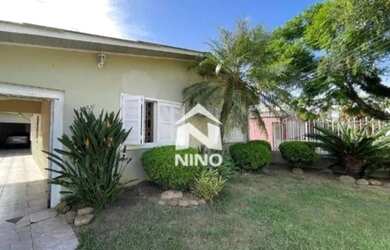 Imagem: A casa possui 3 Dormitórios, 3 Banheiros, 3 Vagas na garagem