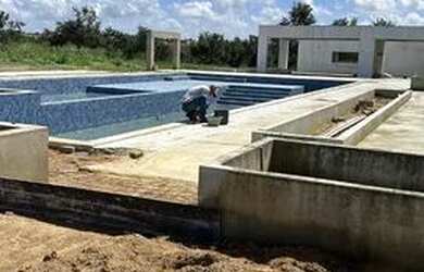 Imagem: O terreno possui 200m² de Área, Imóvel novo e está localizado