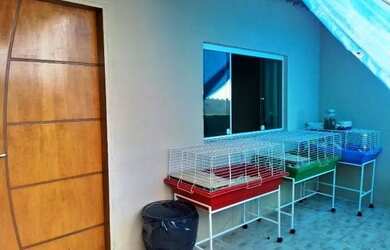 Imagem: A casa possui 5 Dormitórios, 5 Banheiros, 4 Vagas na garagem