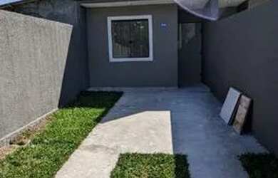 Imagem: A casa possui 2 Dormitórios, 1 Banheiro, 2 Vagas na garagem