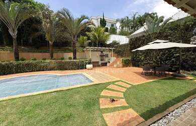 Imagem: A casa em condomínio possui 4 Dormitórios, 5 Banheiros, 4