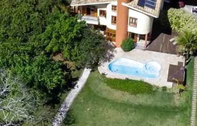 Imagem: A casa possui 4 Dormitórios, 4 Banheiros, 3 Vagas na garagem