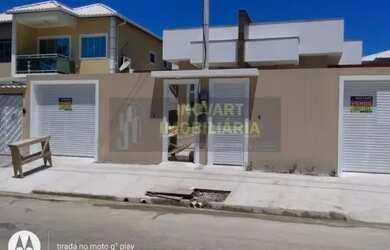 Imagem: A casa possui 3 Dormitórios, 1 Banheiro, 2 Vagas na garagem