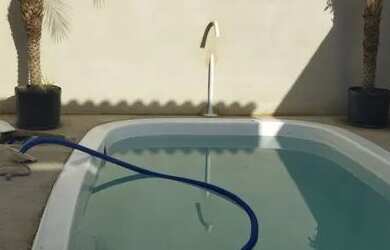 Imagem: A casa possui 2 Dormitórios, 2 Banheiros, 2 Vagas na garagem