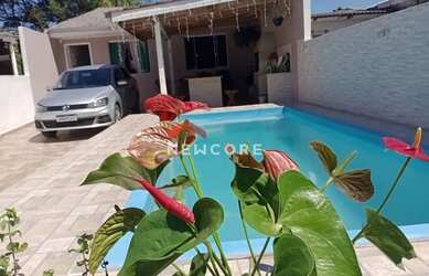 Imagem: A casa possui 3 Dormitórios, 1 Banheiro, 3 Vagas na garagem