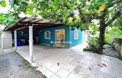 Imagem: A casa possui 3 Dormitórios, 2 Banheiros, 3 Vagas na garagem