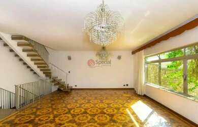 Imagem: A casa possui 4 Dormitórios, 5 Banheiros, 5 Vagas na garagem