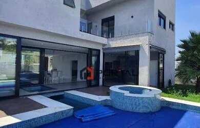 Imagem: A casa em condomínio possui 4 Dormitórios, 4 Banheiros, 3