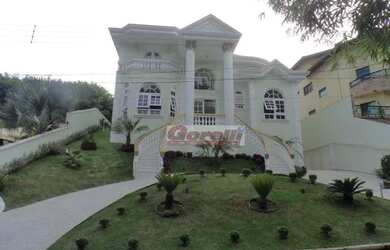 Imagem: A casa em condomínio para alugar possui 4 Dormitórios, 4 Banheiros