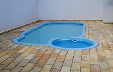 Imagem: O apartamento possui 3 Dormitórios, 1 Banheiro, 1 Vaga na garagem