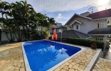 Imagem: A casa em condomínio possui 4 Dormitórios, 5 Banheiros, 4