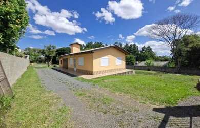 Imagem: A casa possui 2 Dormitórios, 2 Banheiros, 1 Vaga na garagem