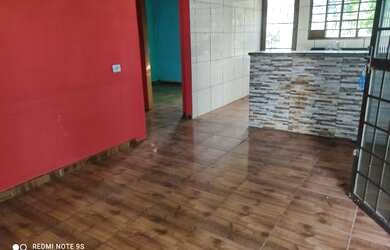 Imagem: A casa possui 2 Dormitórios, 1 Vaga na garagem e está localizado