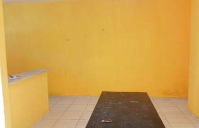 Imagem: A casa possui 2 Dormitórios e 1 Vaga na garagem e está localizado