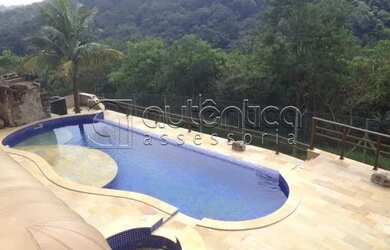 Imagem: A casa em condomínio possui 5 Dormitórios, 5 Banheiros, 5