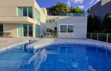 Imagem: A casa em condomínio possui 4 Dormitórios, 5 Banheiros, 5