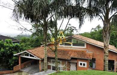 Imagem: A casa em condomínio possui 4 Dormitórios, 4 Banheiros, 4