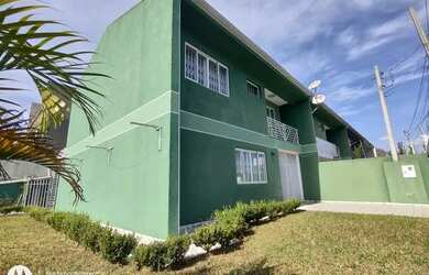 Imagem: A casa possui 3 Dormitórios, 2 Banheiros, 3 Vagas na garagem