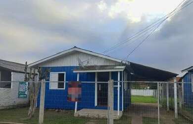 Imagem: A casa possui 2 Dormitórios, 1 Banheiro, 1 Vaga na garagem