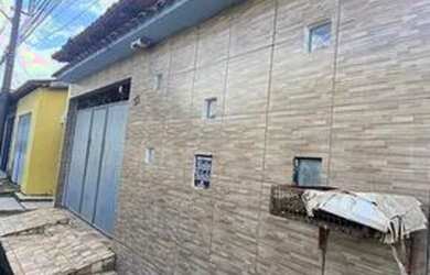 Imagem: A casa possui 3 Dormitórios, 2 Banheiros, 2 Vagas na garagem