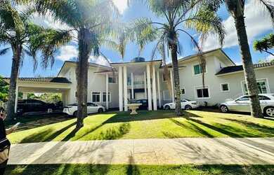 Imagem: A casa em condomínio possui 5 Dormitórios, 5 Banheiros, 5