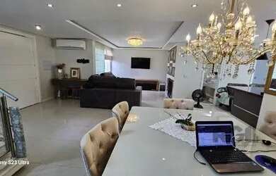 Imagem 14: Casa em Porto Alegre, no bairro Hípica, com 3 dormitório s , e 3 banheiros,...