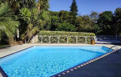 Imagem: A casa em condomínio possui 4 Dormitórios, 5 Banheiros, 5