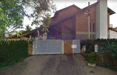 Imagem: A casa possui 5 Dormitórios, 5 Banheiros, 5 Vagas na garagem