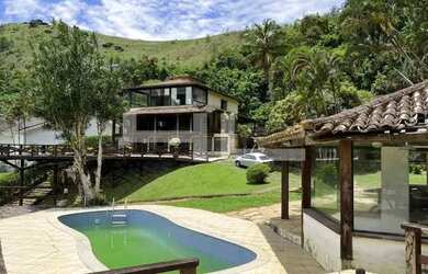 Imagem: A casa em condomínio possui 5 Dormitórios, 5 Banheiros, 5