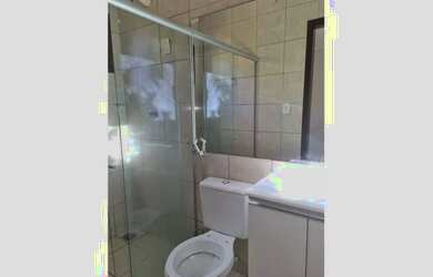 Imagem: A casa possui 3 Dormitórios, 2 Banheiros, 2 Vagas na garagem