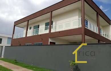 Imagem: A casa possui 4 Dormitórios, 4 Banheiros, 2 Vagas na garagem