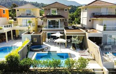 Imagem: A casa possui 5 Dormitórios, 5 Banheiros, 5 Vagas na garagem